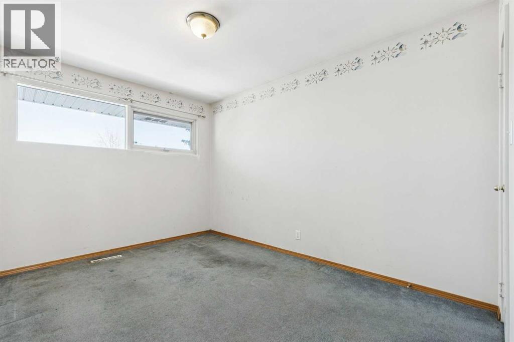 619 Merrill Drive Ne, Calgary, Alberta  T2E 8Y5 - Photo 11 - A2287914