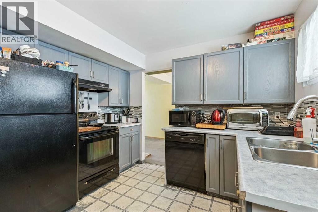 619 Merrill Drive Ne, Calgary, Alberta  T2E 8Y5 - Photo 4 - A2287914