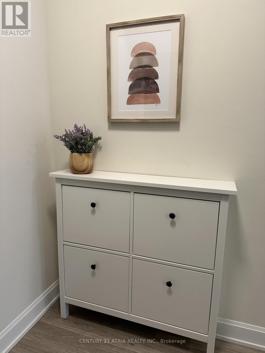 908 - 18 Water Walk Drive, Markham, Ontario  L3R 6L5 - Photo 4 - N12810480