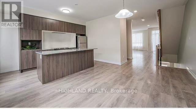 Suite A - 167 Squire Crescent, Oakville, Ontario  L6H 0L7 - Photo 6 - W12810454