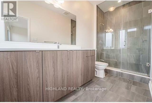 Suite A - 167 Squire Crescent, Oakville, Ontario  L6H 0L7 - Photo 9 - W12810454
