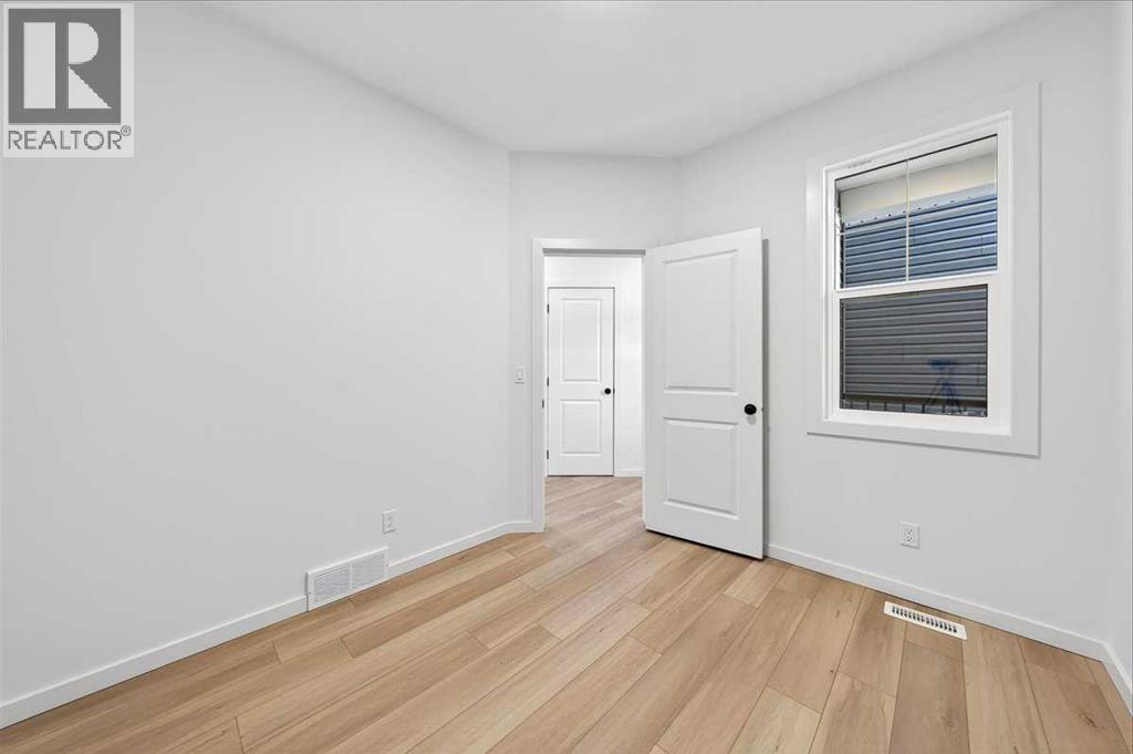 14 Osprey Hill Bay Sw, Calgary, Alberta  T3B 6S2 - Photo 17 - A2279025