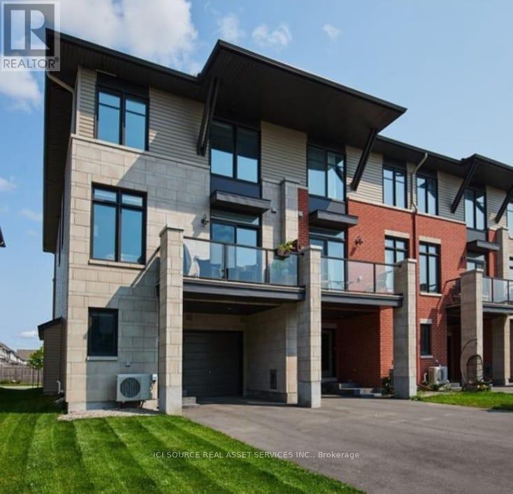 This luxurious END-CORNER TOWNHOME stands out with over $20,000 in premium upgrades, offering elevated living in a family-friendly neighbourhood. As a desirable end unit, it provides added privacy and an abundance of natural light throughout. The home is thoughtfully upgraded with hardwood floors, quartz countertops,  custom-made blinds, all the appliances. Integrated smart-home features add everyday comfort, efficiency, and modern convenience. The open-concept main floor is bright and inviting, with large windows and a spacious balcony - perfect for relaxing, entertaining, or summer BBQs. Upstairs, the elegant primary suite features a walk-in closet and a spa-inspired ensuite with a large shower. The second bedroom is ideal for guests, a nursery, or a stylish home office. A deep garage, driveway for two vehicles, and additional basement storage complete this exceptional property. Located just steps from schools, parks, grocery stores, and transit - everything you need is right at your doorstep. Note: Furniture can be inlcuded with the sale. *For Additional Property Details Click The Brochure Icon Below* (id:48254)