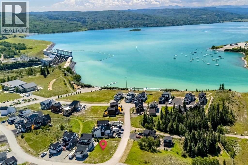 423 Cottageclub Cove, Rural Rocky View County, Alberta  T4C 1B1 - Photo 2 - A2286342