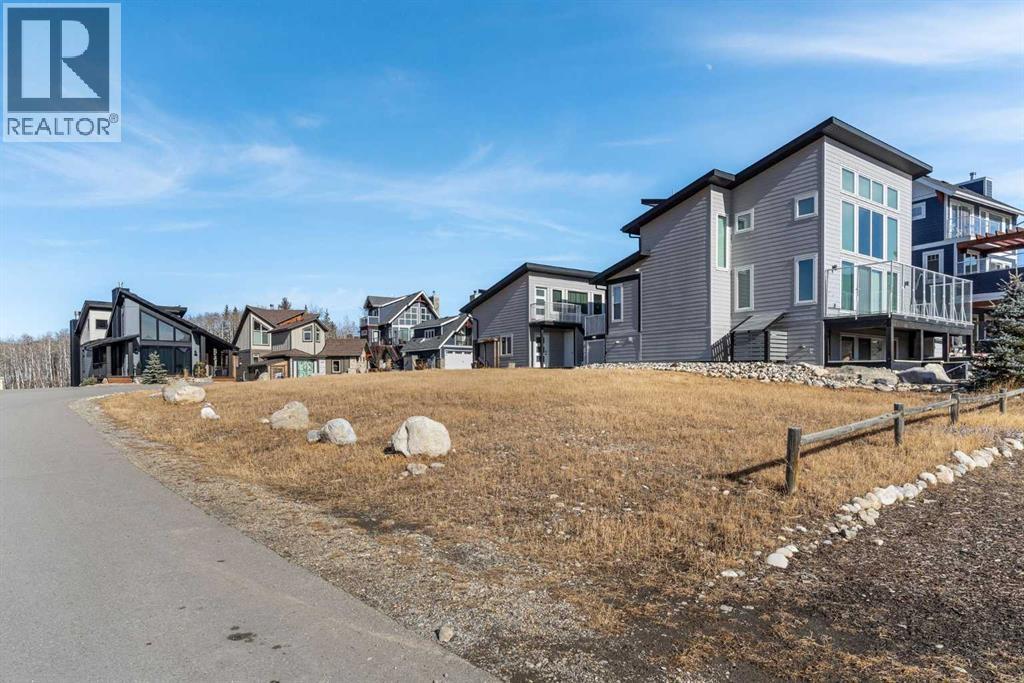 423 Cottageclub Cove, Rural Rocky View County, Alberta  T4C 1B1 - Photo 5 - A2286342