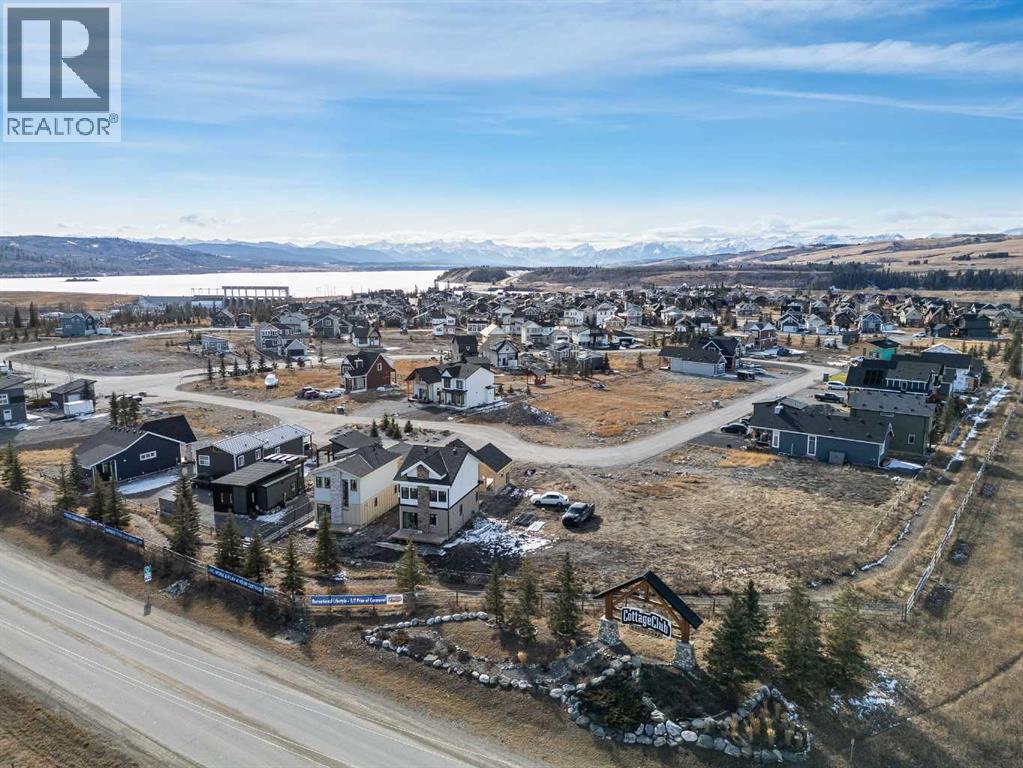 423 Cottageclub Cove, Rural Rocky View County, Alberta  T4C 1B1 - Photo 19 - A2286342