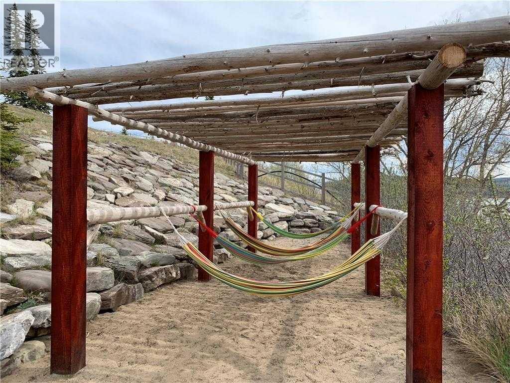 423 Cottageclub Cove, Rural Rocky View County, Alberta  T4C 1B1 - Photo 34 - A2286342