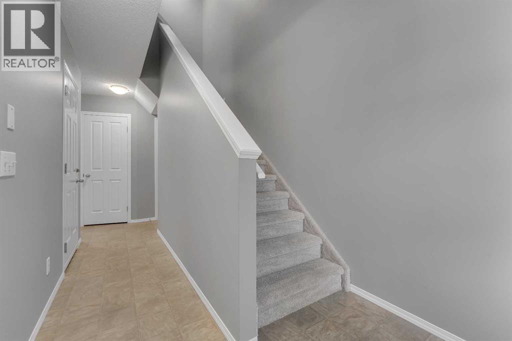 68 Panatella Villas Nw, Calgary, Alberta  T3K 0G6 - Photo 3 - A2286938