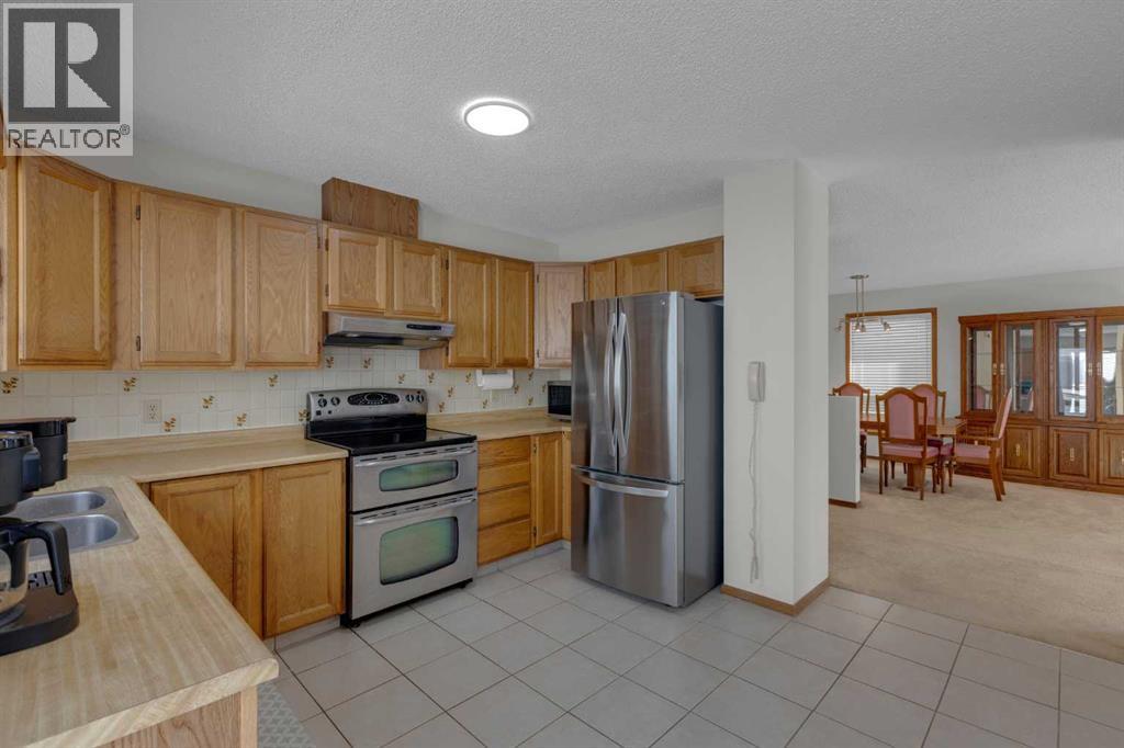 92 Macewan Drive Nw, Calgary, Alberta  T3K 2P7 - Photo 7 - A2287900