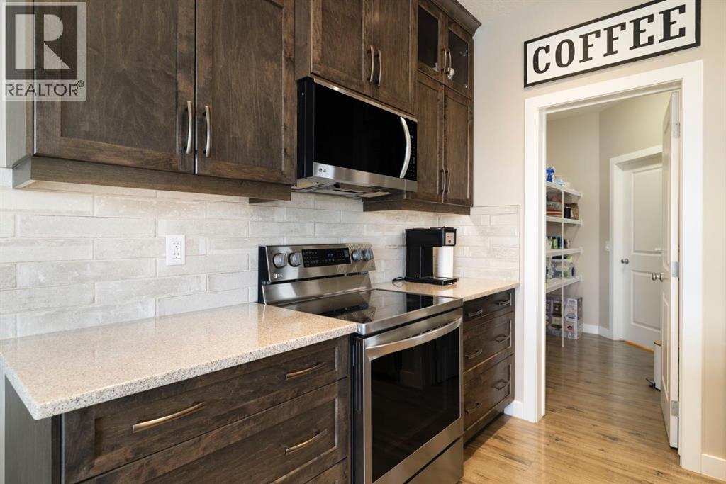 8 Emberside Glen, Cochrane, Alberta  T4C 2L6 - Photo 14 - A2282601