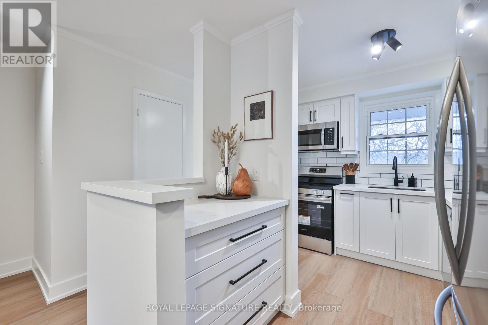 6 - 101 Glen Manor Drive, Toronto, Ontario  M4E 3V3 - Photo 7 - E12811486