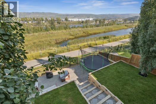 50 Riviera View, Cochrane, Alberta  T4C 0Y7 - Photo 39 - A2274325