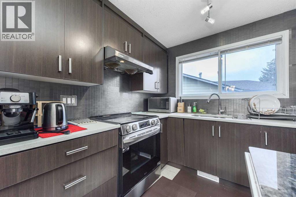 144 Rundleson Place Ne, Calgary, Alberta  T1Y 3T4 - Photo 6 - A2285450