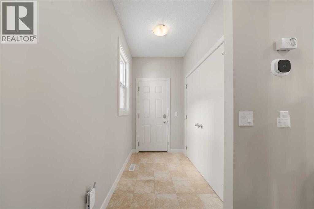 151 Heritage View, Cochrane, Alberta  T4C 0G5 - Photo 5 - A2286321