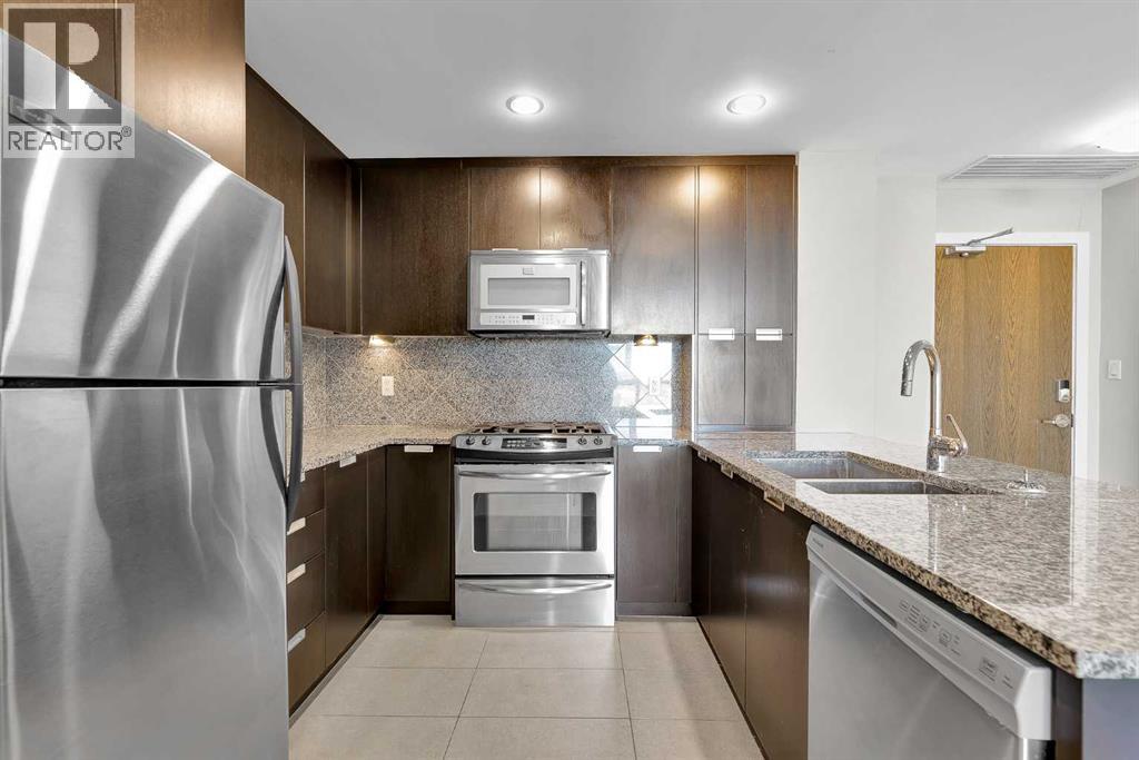 907, 99 Spruce Place Sw, Calgary, Alberta  T2V 5G5 - Photo 5 - A2284451