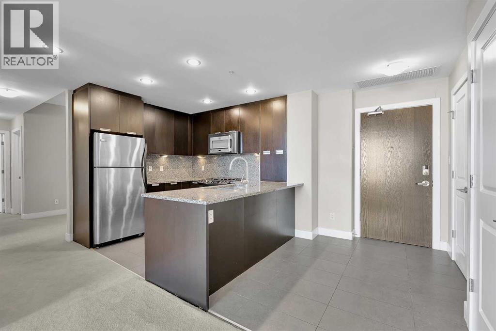 907, 99 Spruce Place Sw, Calgary, Alberta  T2V 5G5 - Photo 3 - A2284451