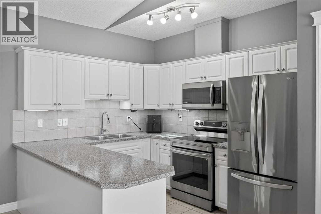 303, 149 Mcrae Street, Okotoks, Alberta  T1S 2H4 - Photo 6 - A2284379