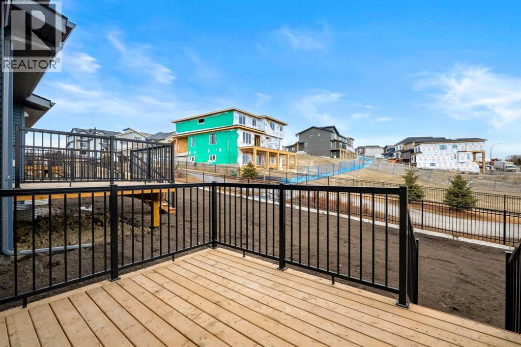 27 Heritage Heath, Cochrane, Alberta T4C 3L3 - Photo 4 - A2285356
