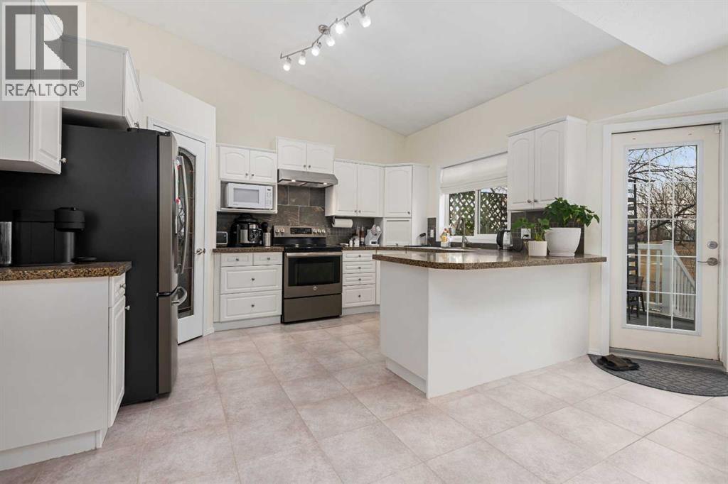 704 Woodside Drive, Airdrie, Alberta  T4B 2G9 - Photo 13 - A2284096