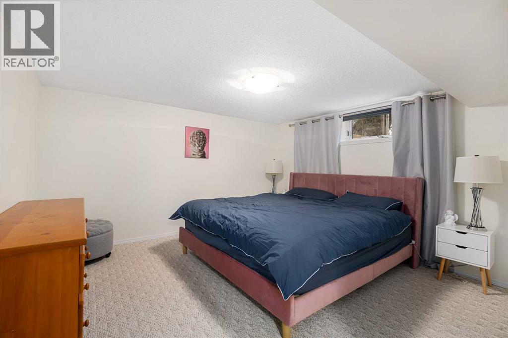 704 Woodside Drive, Airdrie, Alberta  T4B 2G9 - Photo 45 - A2284096