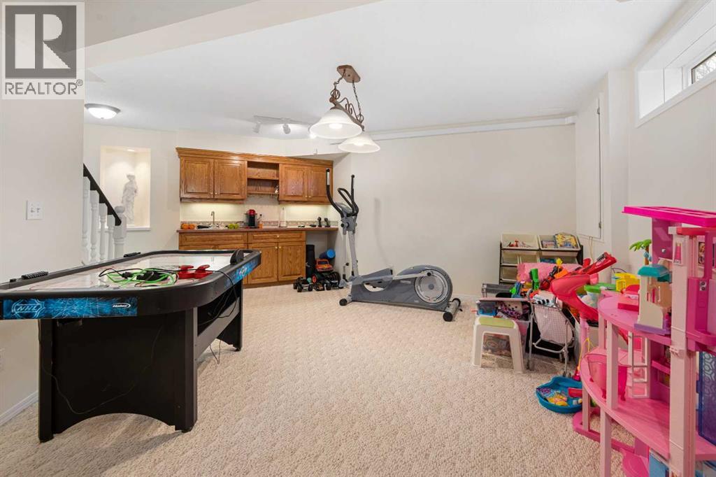 704 Woodside Drive, Airdrie, Alberta  T4B 2G9 - Photo 36 - A2284096