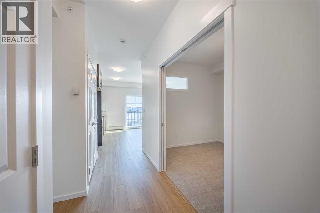 1403, 755 Copperpond Boulevard Se, Calgary, Alberta  T2Z 4R2 - Photo 5 - A2287814