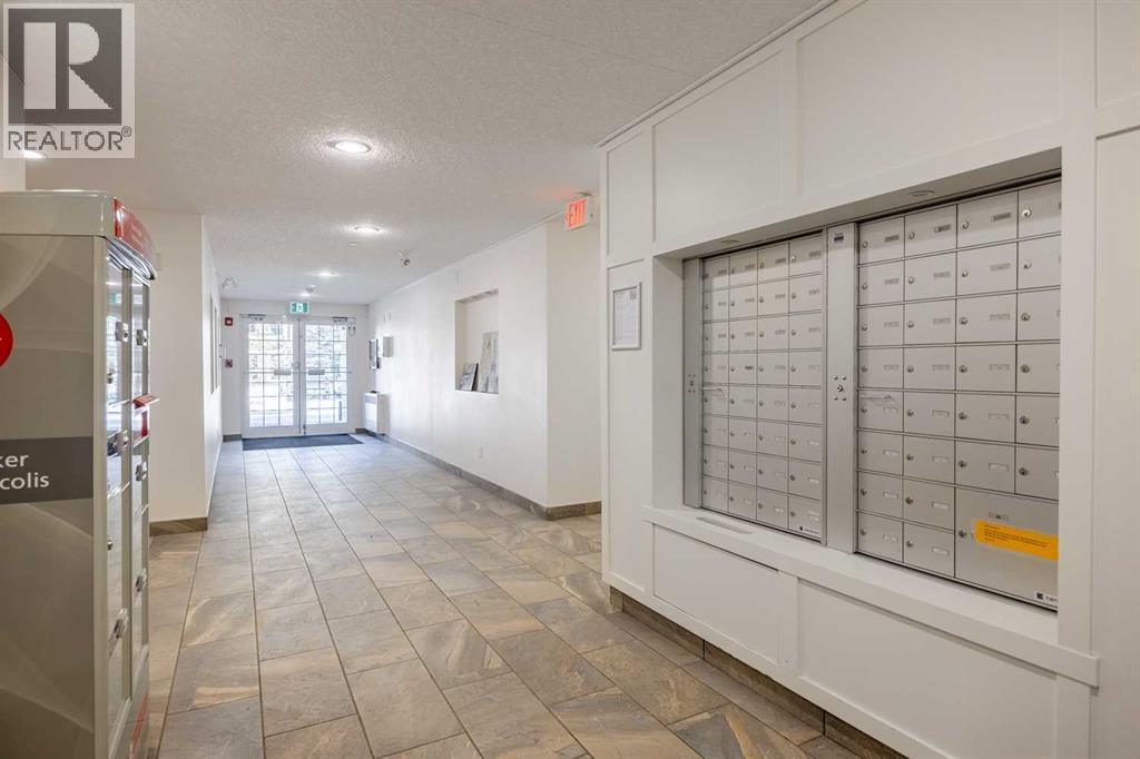 1403, 755 Copperpond Boulevard Se, Calgary, Alberta  T2Z 4R2 - Photo 24 - A2287814