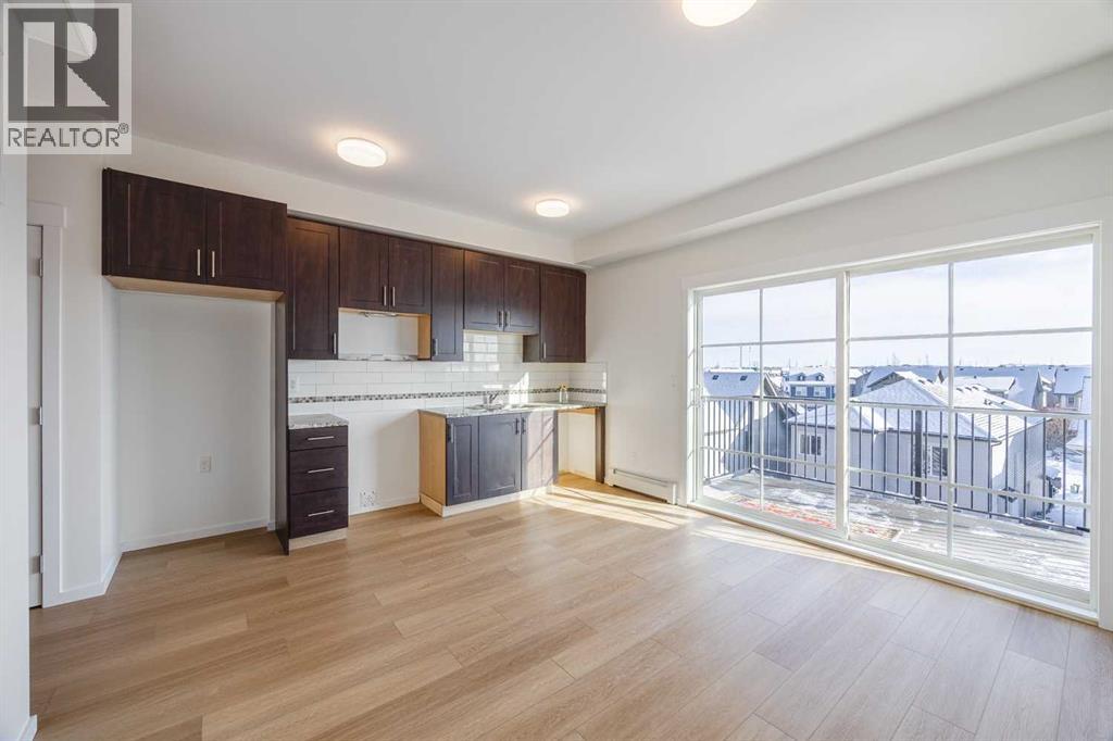 1403, 755 Copperpond Boulevard Se, Calgary, Alberta  T2Z 4R2 - Photo 7 - A2287814