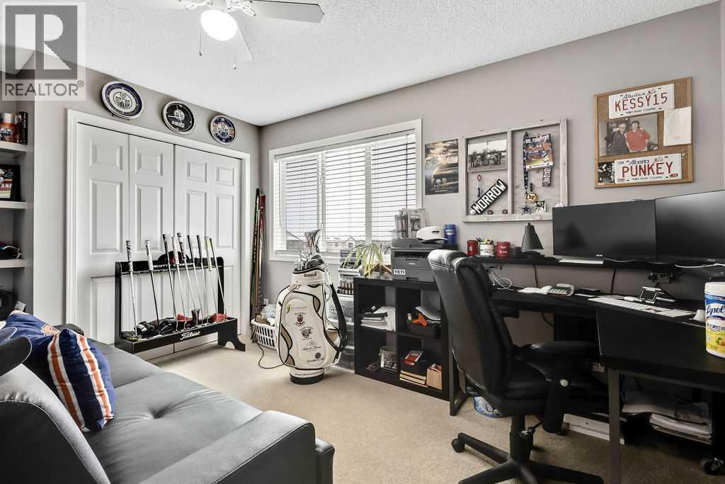 155 Cimarron Grove Circle, Okotoks, Alberta  T1S 2M1 - Photo 19 - A2274025