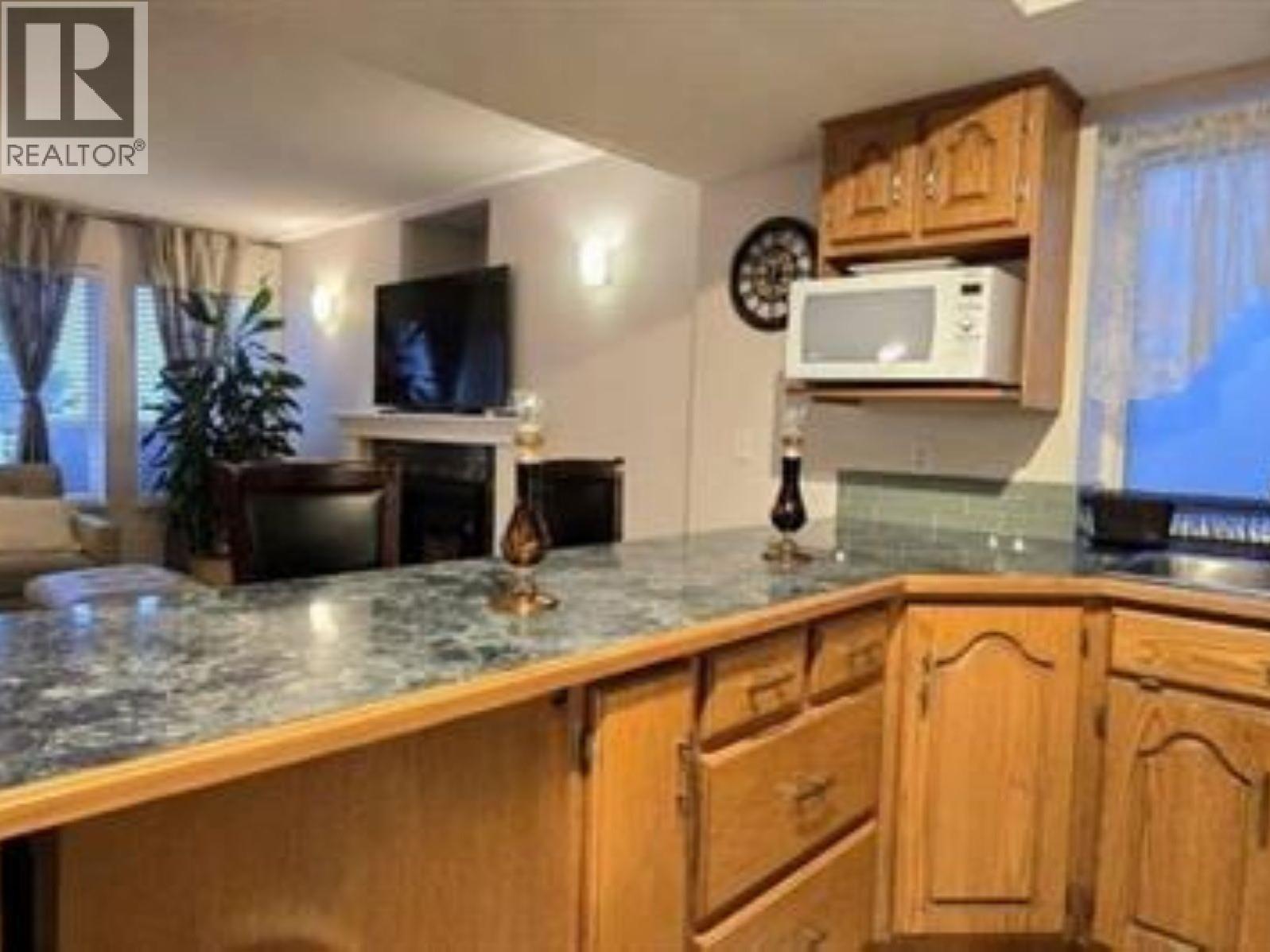 Ground Level House-1265 Fletcher Way, Port Coquitlam, British Columbia  V3C 6B5 - Photo 4 - R3092632