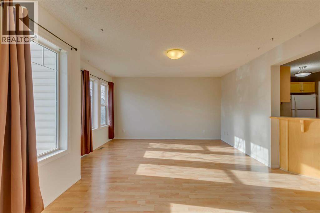 228 Luxstone Place Sw, Airdrie, Alberta T4B 3C1 - Photo 4 - A2275761