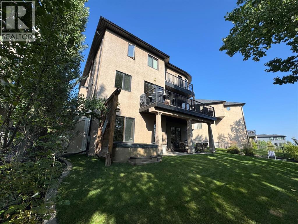 48 Coulee Park Sw, Calgary, Alberta  T3H 5J5 - Photo 47 - A2288022