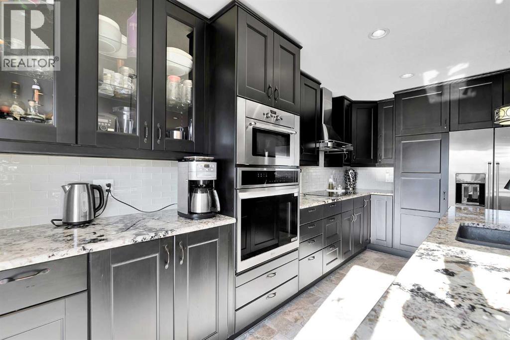 12 Bridleridge Court Sw, Calgary, Alberta  T2Y 4M5 - Photo 8 - A2286980