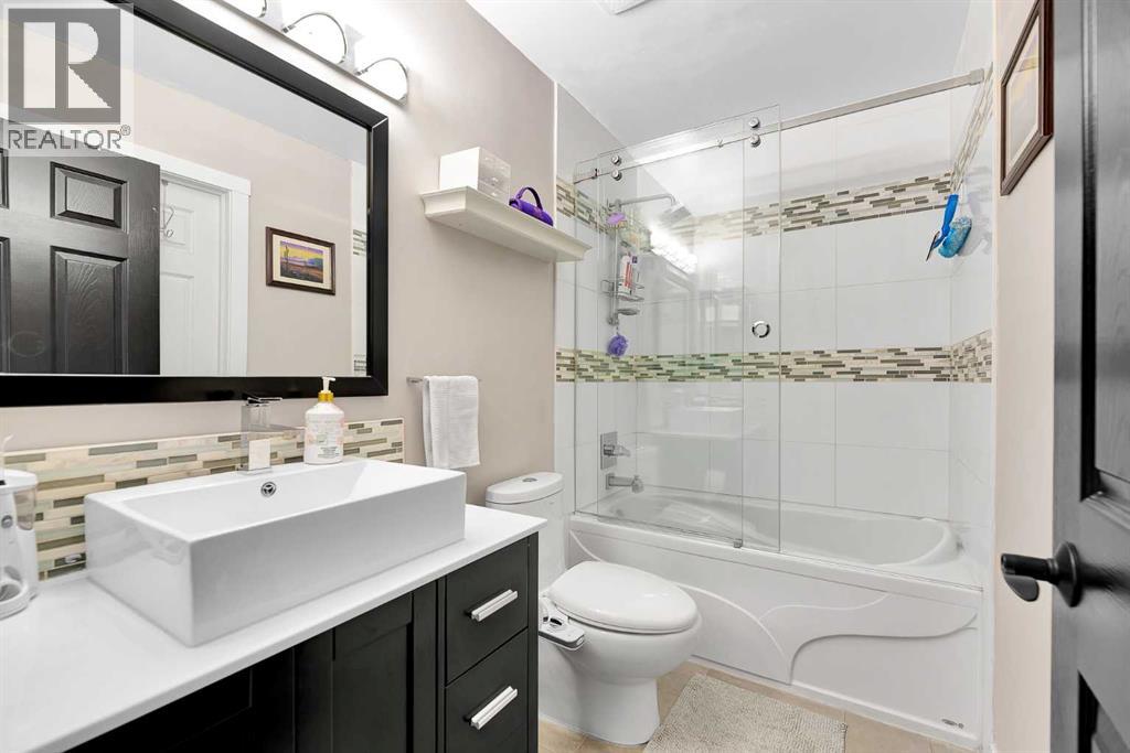 12 Bridleridge Court Sw, Calgary, Alberta  T2Y 4M5 - Photo 18 - A2286980