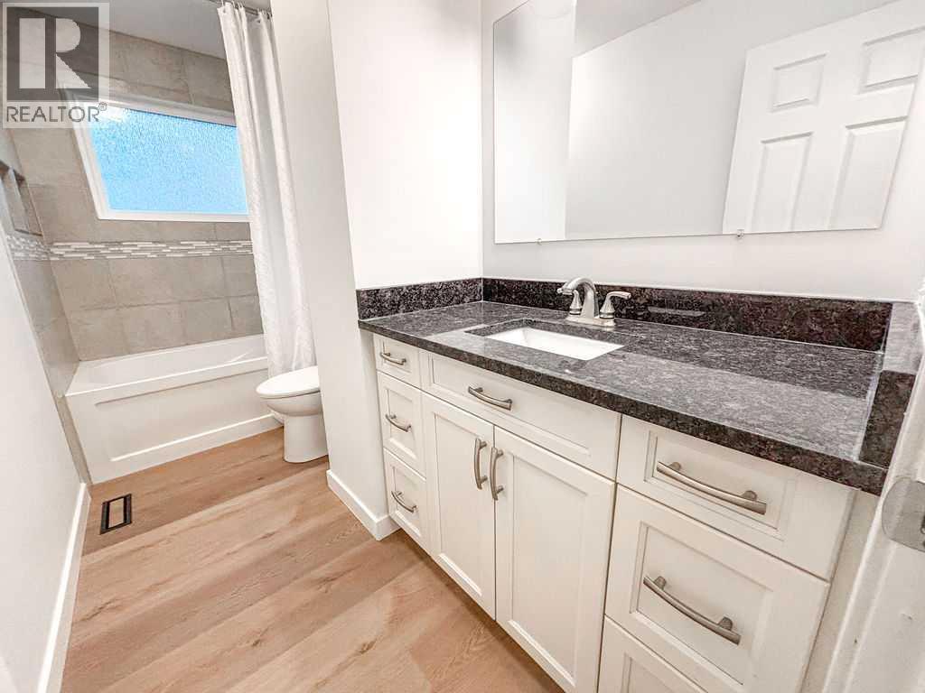 12 Oakbury Place Sw, Calgary, Alberta  T2V 4A2 - Photo 10 - A2287402