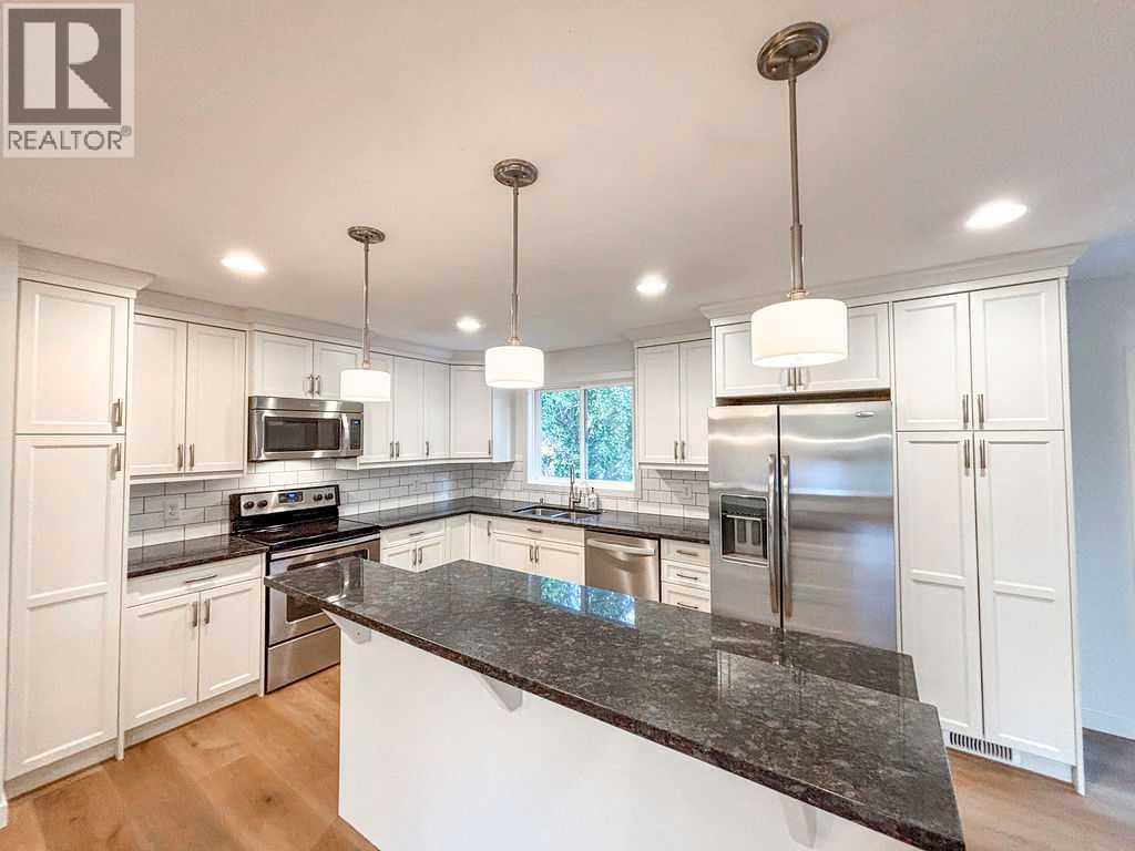 12 Oakbury Place Sw, Calgary, Alberta  T2V 4A2 - Photo 6 - A2287402