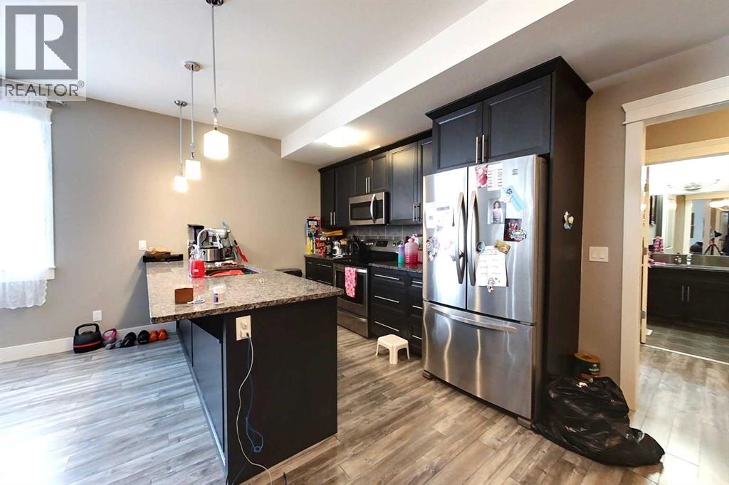 102, 605 6 Avenue Se, Slave Lake, Alberta  T0G 2A3 - Photo 5 - A2286351