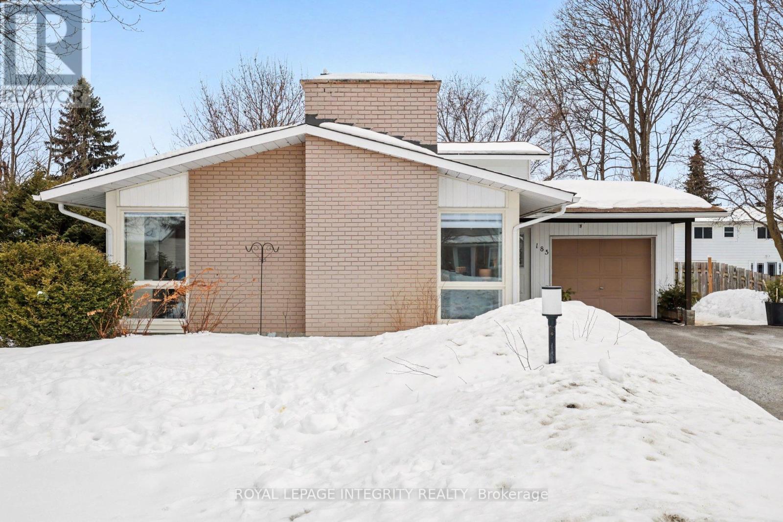 This split-level beauty is bigger than it looks and perfectly positioned on a generous lot in the central, sought-after Ryan Farm neighbourhood. You're just steps from Algonquin College, College Square, great transit and plenty of parks - perfect for morning strolls and weekend adventures. Inside, natural light fills the main floor living room, anchored by a cozy stone surround electric fireplace. The attached dining area overlooking the front yard is perfect for entertaining, with smart built-ins for extra storage. The updated kitchen shines with granite countertops, terrific storage and a sunny eat-in peninsula with an additional space for a coffee nook. Down a few steps, a spacious family room opens to the backyard, alongside a large bedroom that could be your primary suite or a special inter-generational space, complete with a private ensuite and larger glass shower. Upstairs, two more generous bedrooms, including one with custom closets and private bath access, while the other offers a bright, cheerful hideaway for kids - or for anyone who loves a cozy spot to read. The basement is ready to expand your living space and features a brand-new modern bathroom with an extra long freestanding bathtub. Outside, your own city oasis awaits: a refreshing and beautiful in-ground pool with stone surround and deck, perfect for summer nights and weekend entertaining. A home this thoughtfully designed, in such a convenient location, really has it all- it's a place you'll be proud to call home, home. Come fall in love with 185 Withrow. (id:48254)