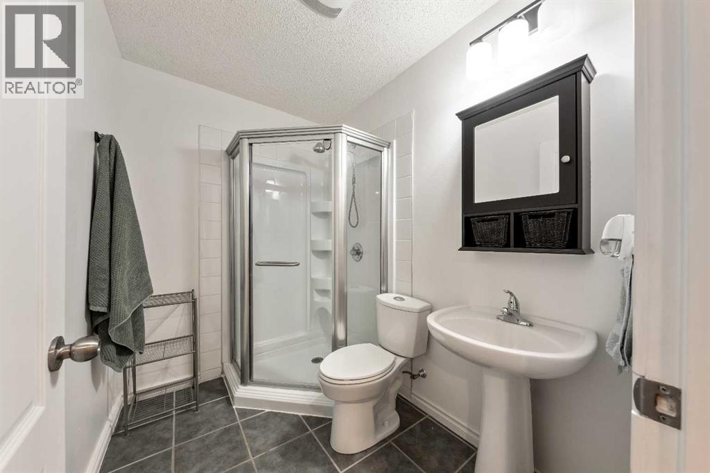 21 Mckinnon Street Nw, Langdon, Alberta  T0J 1X2 - Photo 34 - A2274079