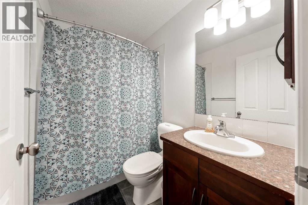 21 Mckinnon Street Nw, Langdon, Alberta  T0J 1X2 - Photo 24 - A2274079