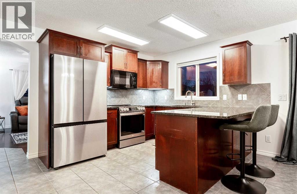 21 Mckinnon Street Nw, Langdon, Alberta  T0J 1X2 - Photo 9 - A2274079