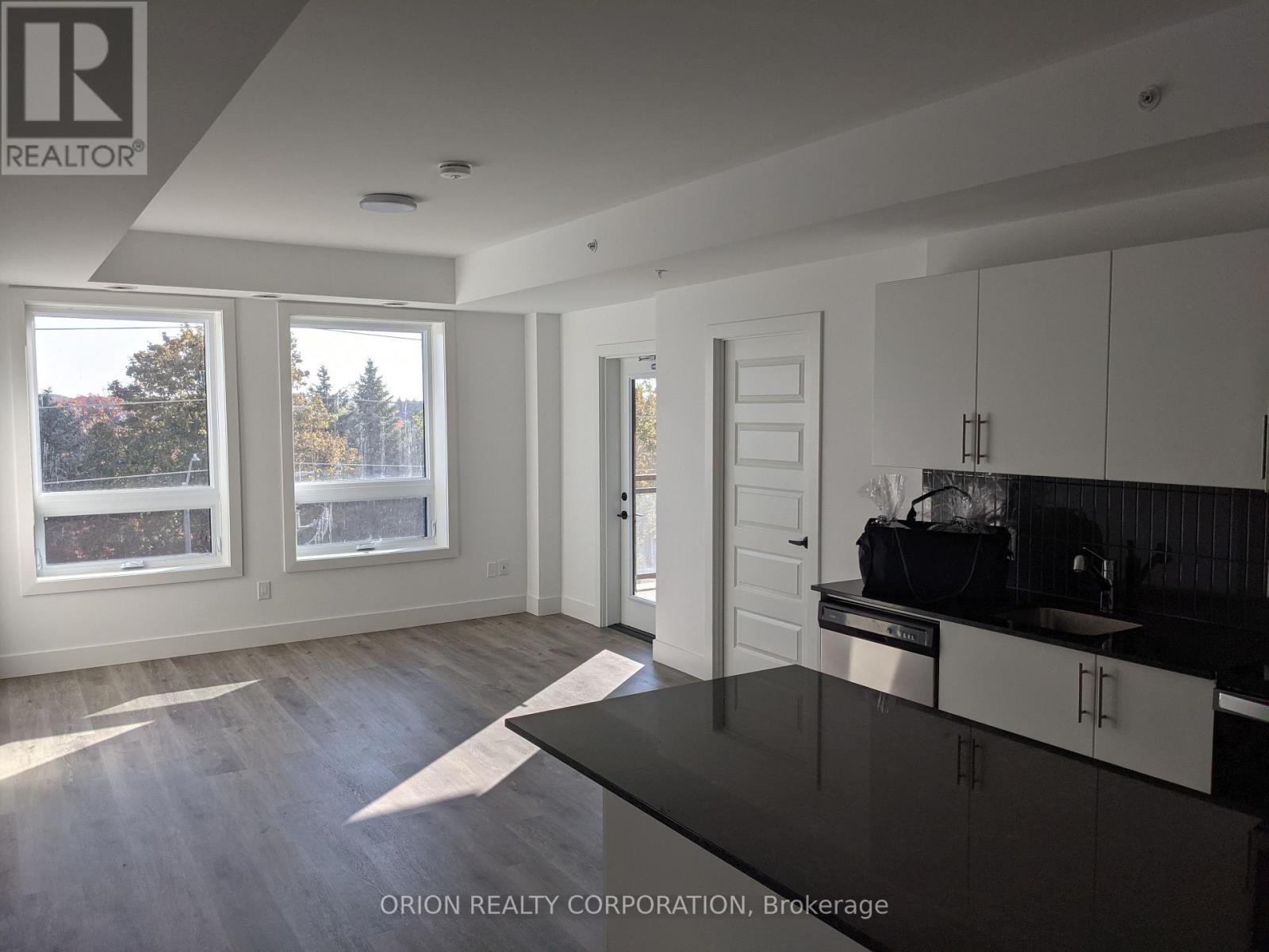 404 - 26 Lowes Road W, Guelph, Ontario  N1G 4X2 - Photo 2 - X12814542