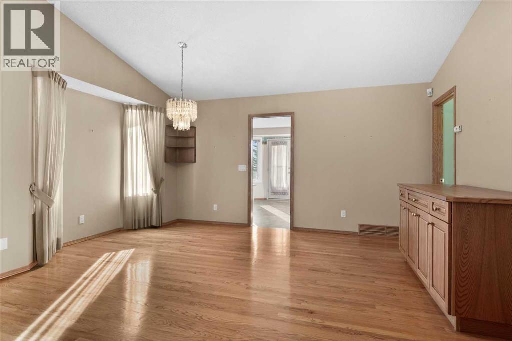 222 Arbour Cliff Close Nw, Calgary, Alberta  T3G 3W7 - Photo 6 - A2286436