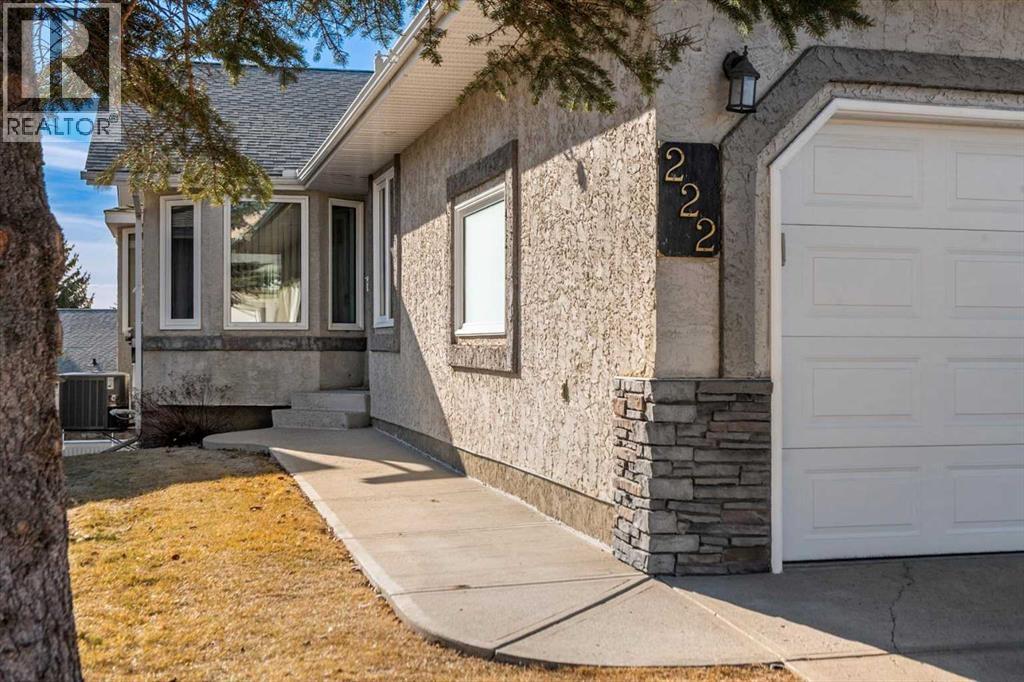 222 Arbour Cliff Close Nw, Calgary, Alberta  T3G 3W7 - Photo 2 - A2286436