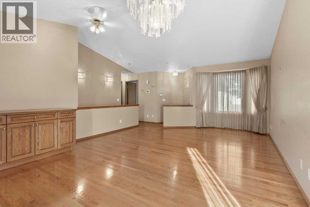 222 Arbour Cliff Close Nw, Calgary, Alberta  T3G 3W7 - Photo 5 - A2286436