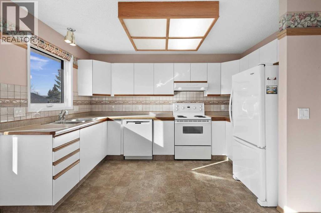 222 Arbour Cliff Close Nw, Calgary, Alberta  T3G 3W7 - Photo 9 - A2286436