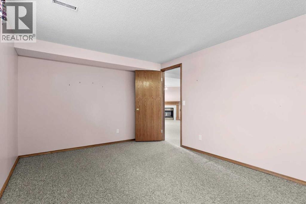 222 Arbour Cliff Close Nw, Calgary, Alberta  T3G 3W7 - Photo 32 - A2286436