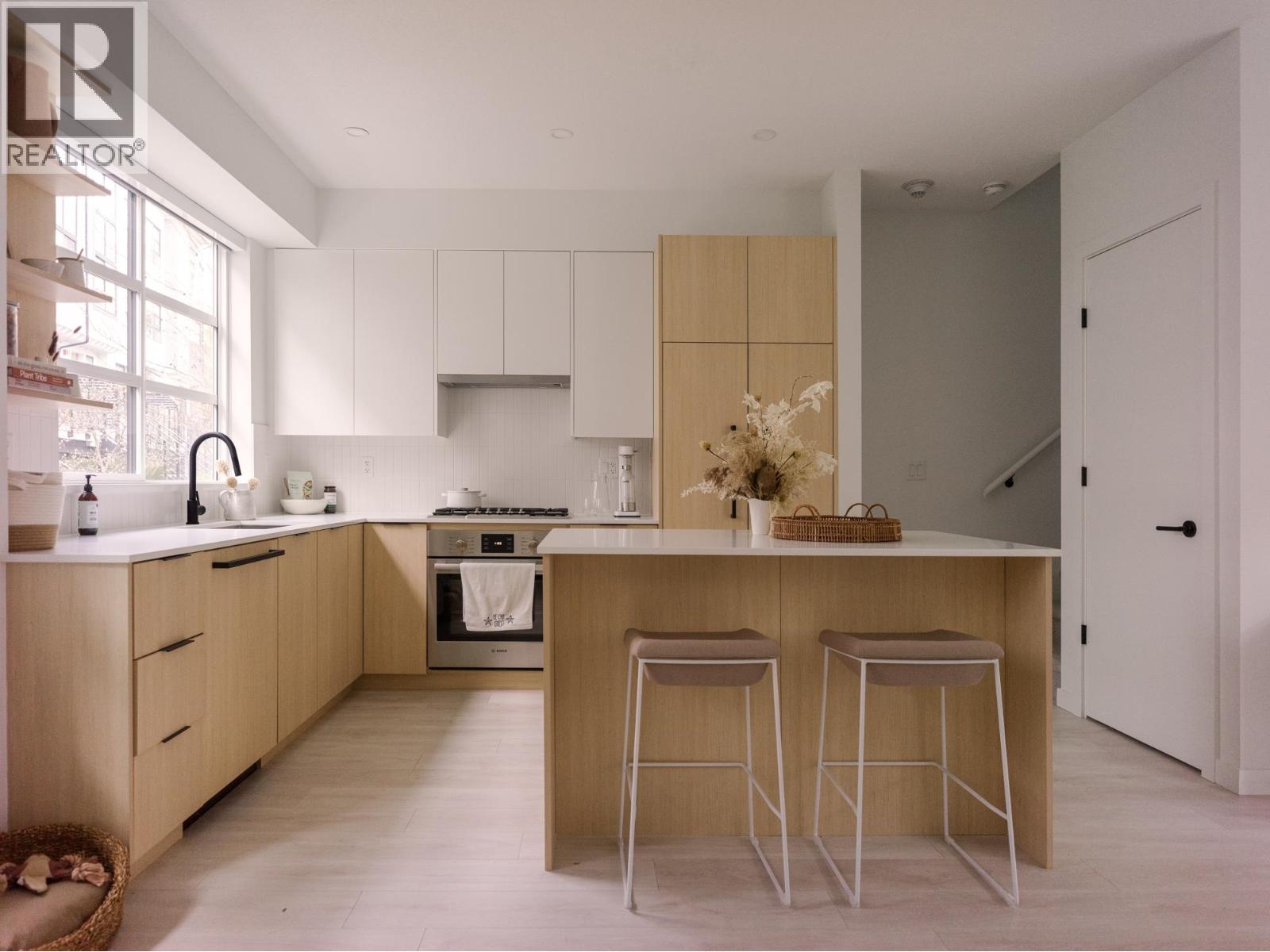 126 2045 Heritage Park Lane, North Vancouver, British Columbia  V7H 0E3 - Photo 1 - R3091858