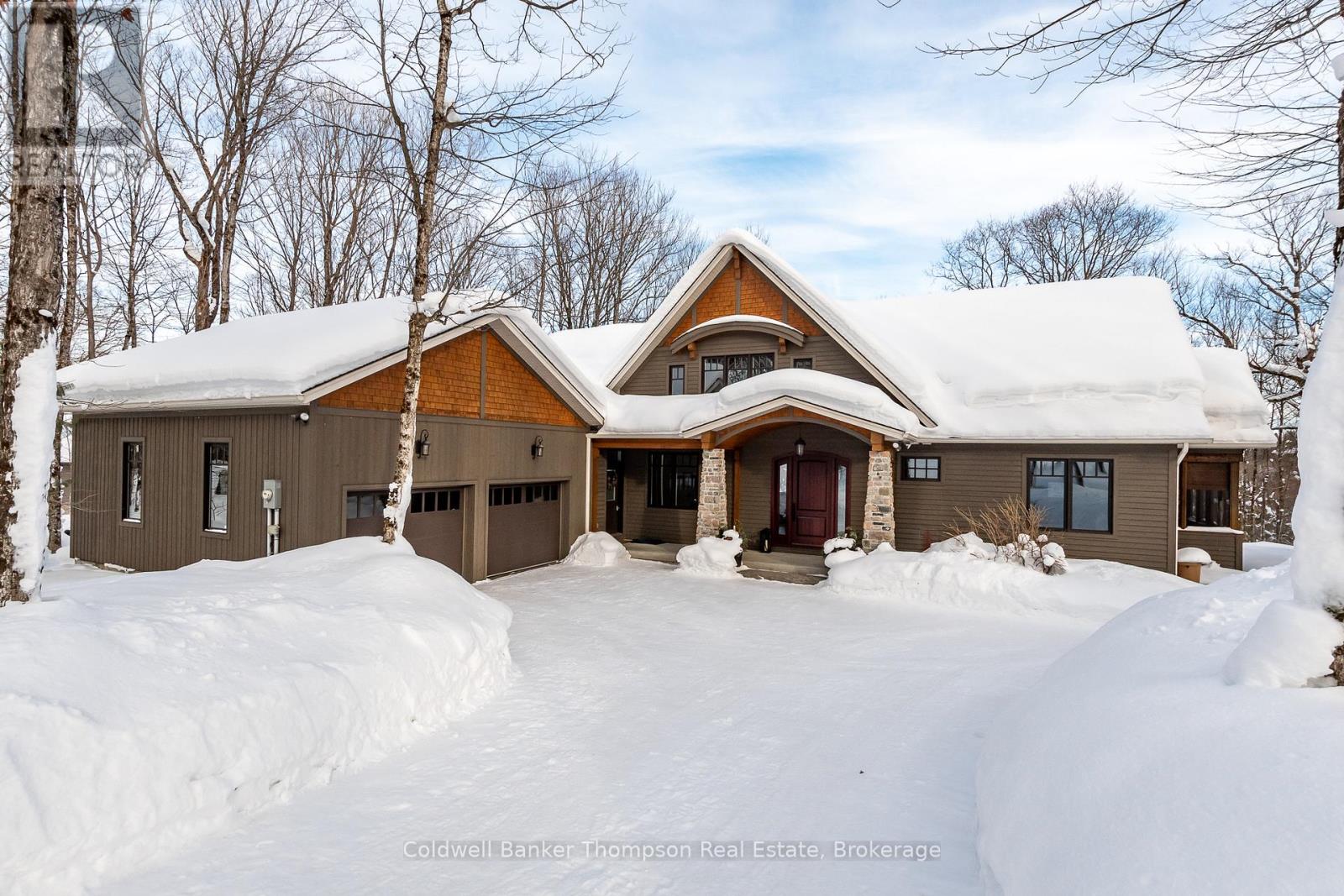 <div class="slider-price">$1,499,900</div><p>11 Forest Hill Lane, Huntsville, Ontario</p>