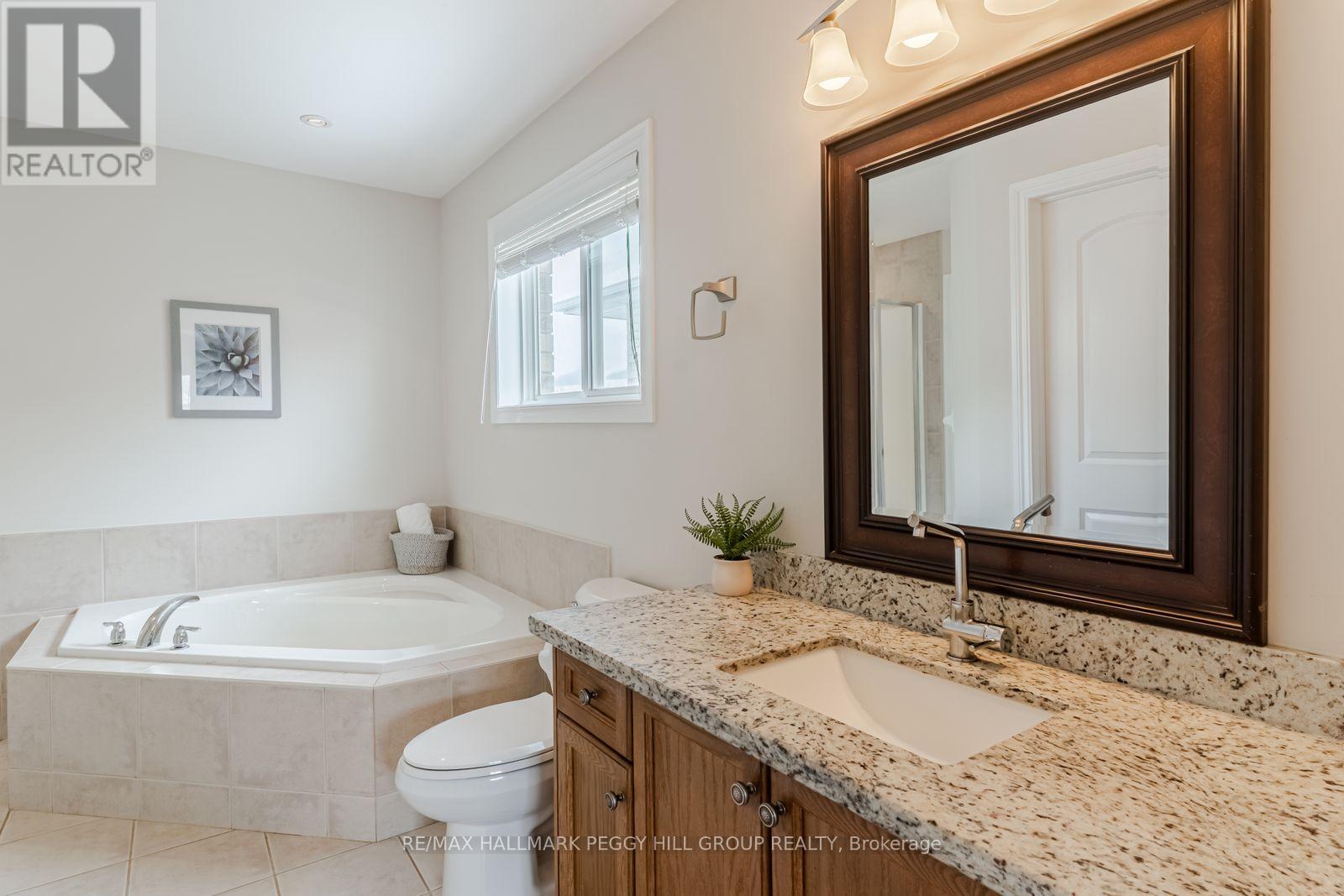 39 Mike Hart Drive, Essa, Ontario  L3W 0P6 - Photo 7 - N12815936